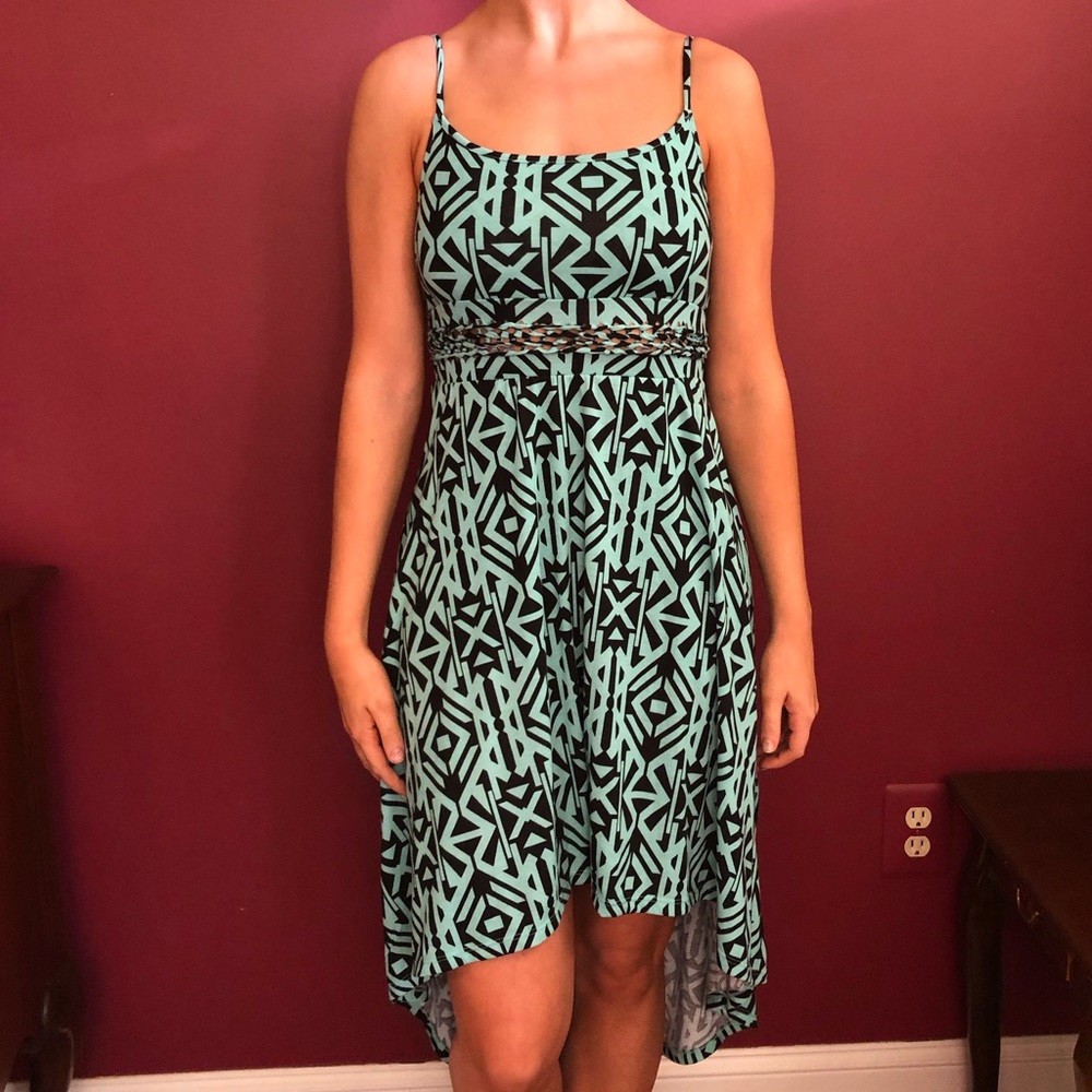 Woman’s aqua tribal high-low dress
